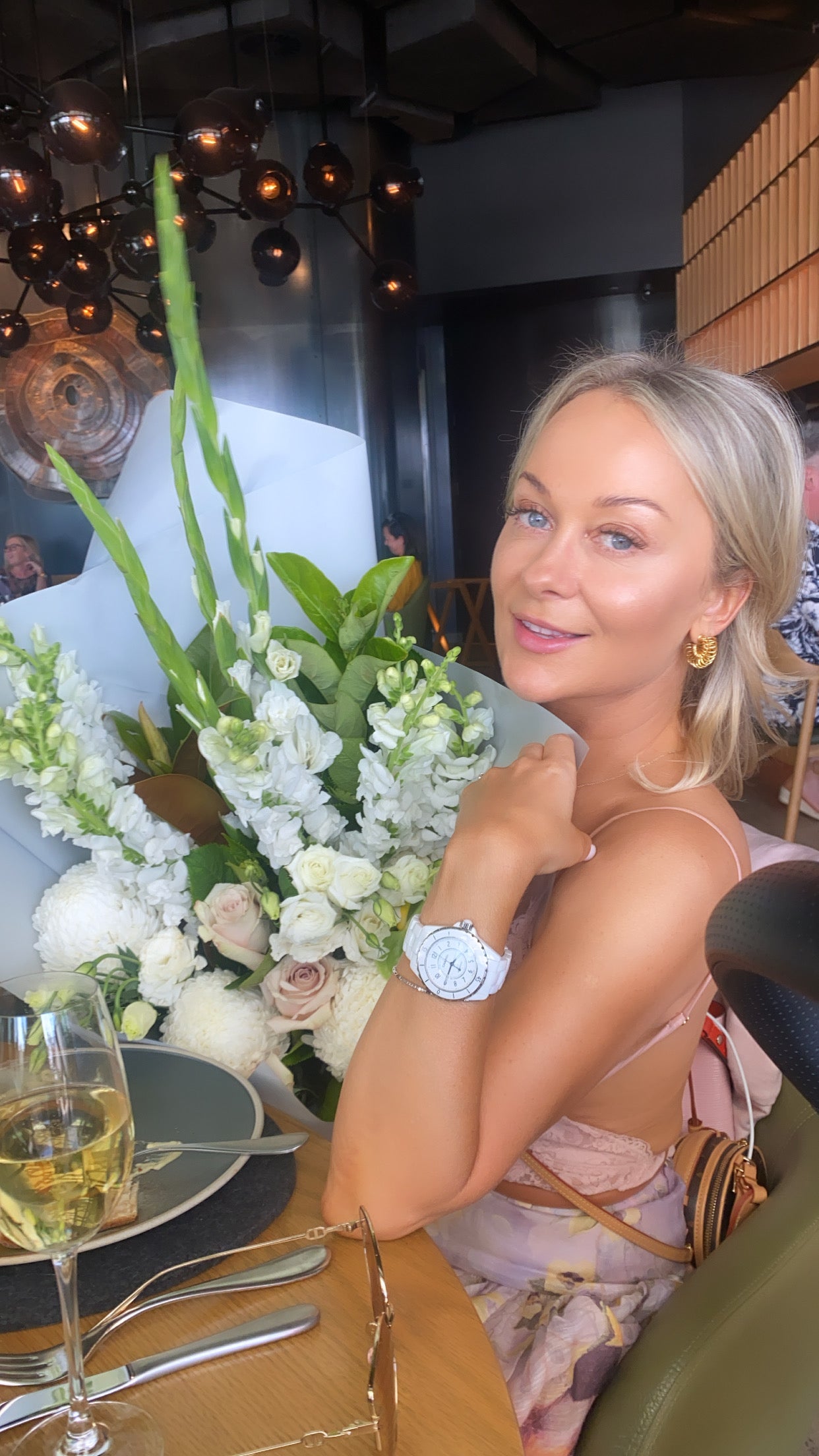 Natasha founder of Ms.Lova Tan with natural glowing bronzed skin