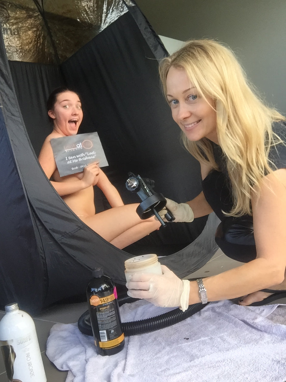Student completing practical spray tan training with Natasha during a private hands-on Ms.Lova training session in Sydney.